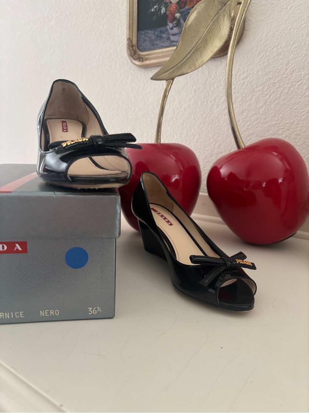 Prada Black Patent Leather Peep-Toe Wedges with Bow and Gold Accent